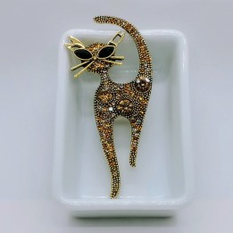 Broche chat en strass or, diamants fantaisie, yeux argent