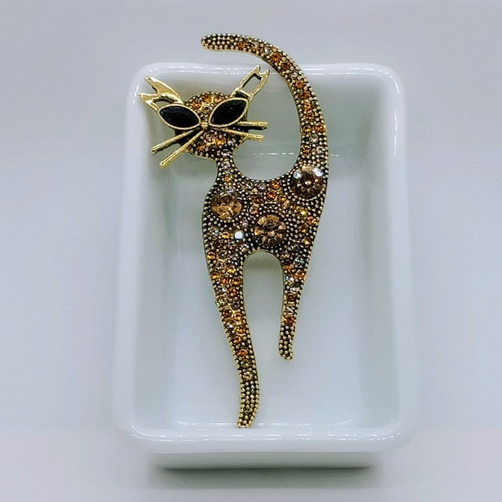 Broche chat en strass or, diamants fantaisie, yeux argent